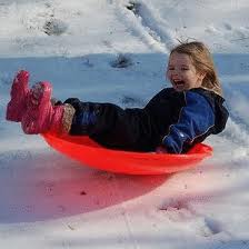 sledding fun day at  boston golf courses photo