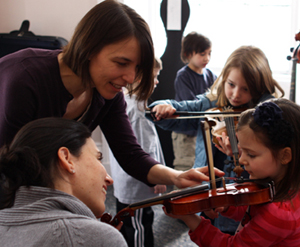 brookline music school open house  instrument petting zoo photo